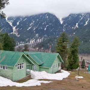 Huts in Kashmir golden wheels